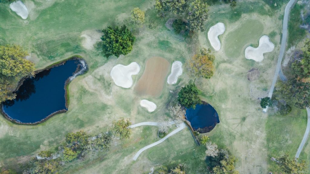 A view of some golf holes from above.