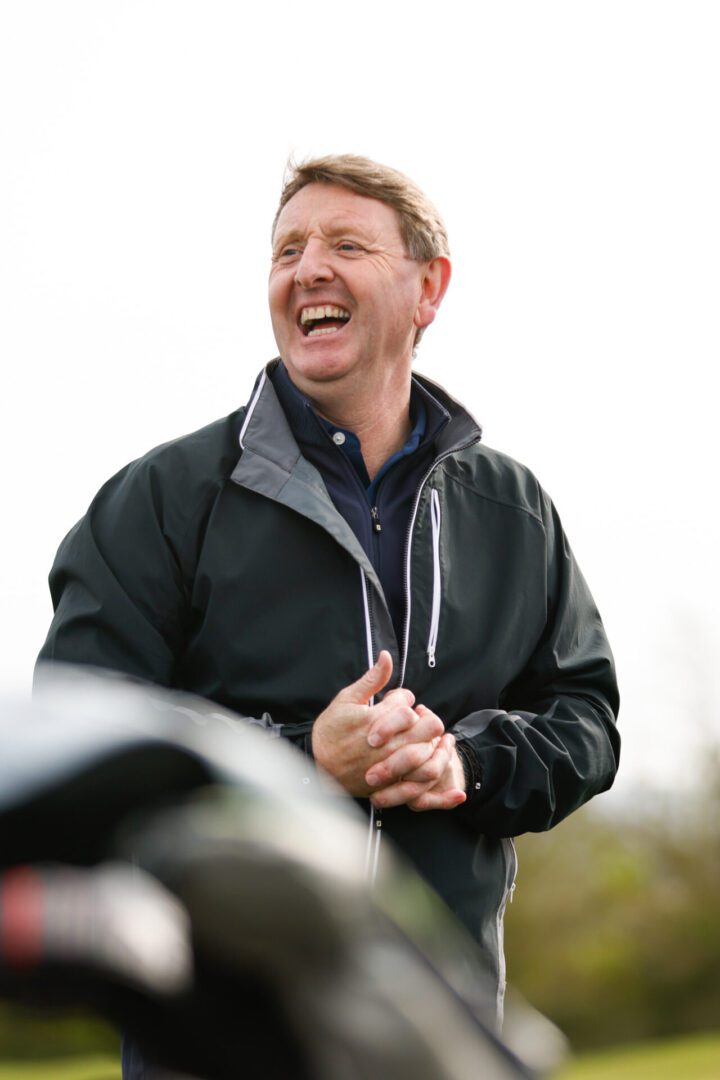 Golfer enjoying a relaxed easy driver swing day at The Oxfordshire