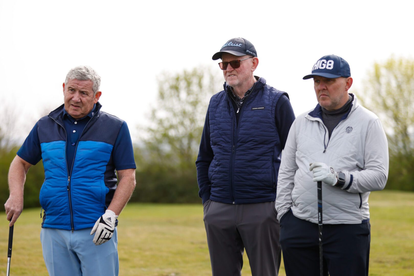 Golfers watching easy driver swing coaching at The Oxfordshire